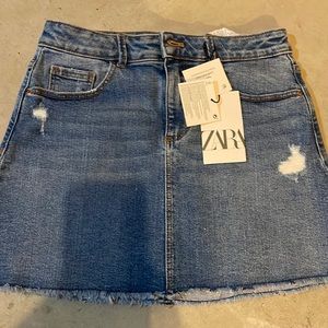 NWT Jean skirt. Never worn girls Zara jean skirt with rips